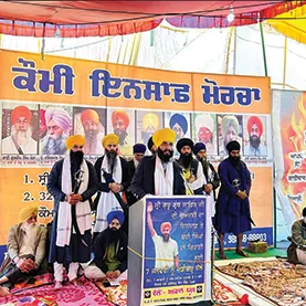 Diwan held under a marquee at a public gathering